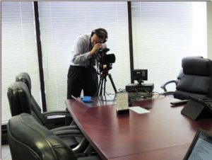 Lake Cook Reporting legal videographer demonstrating legal video deposition services.